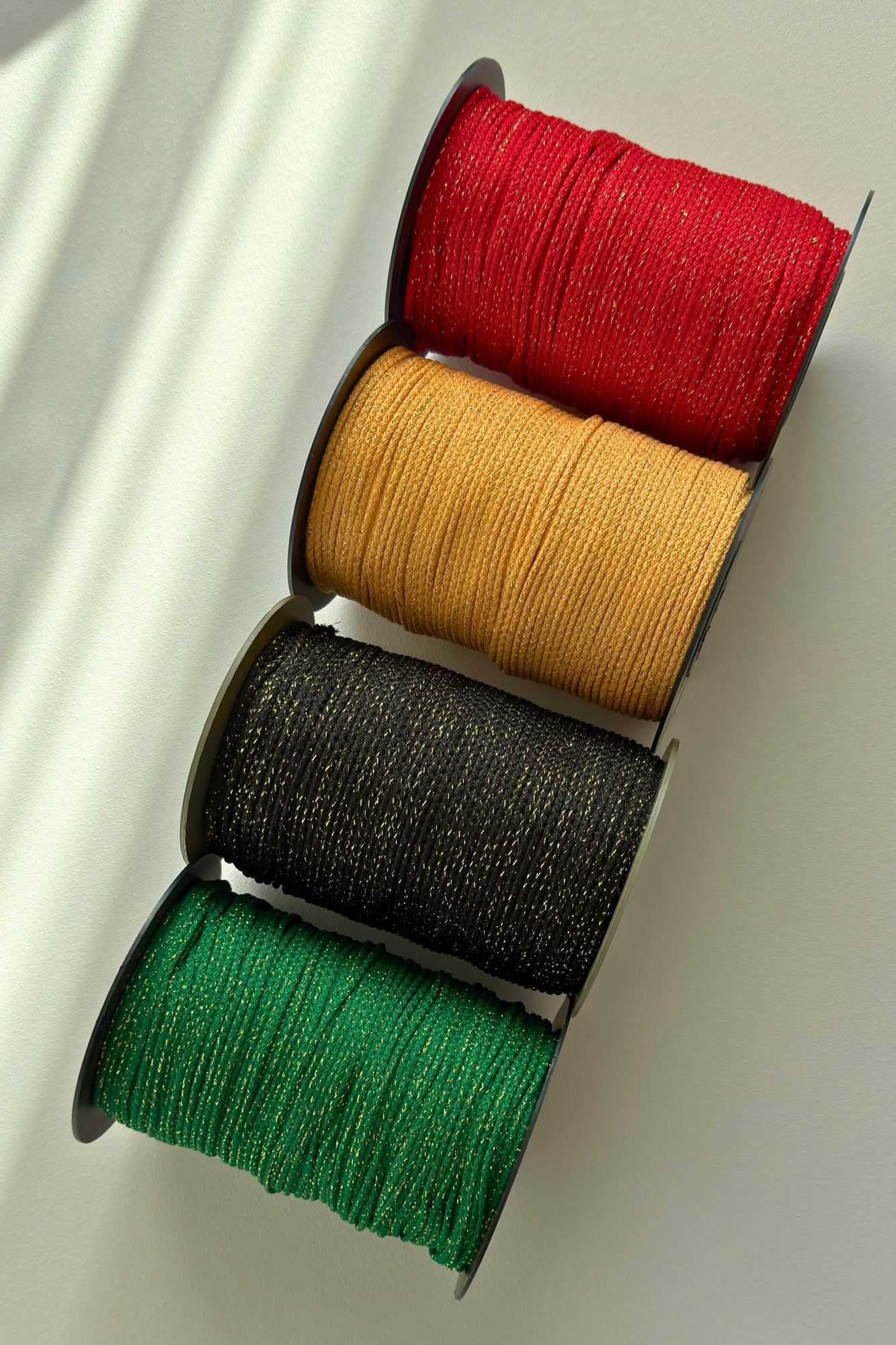 Close-up of 3mm polyester cord showing golden shimmer detail