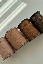 Close-up of 3mm brown macrame cord showing golden shimmer detail