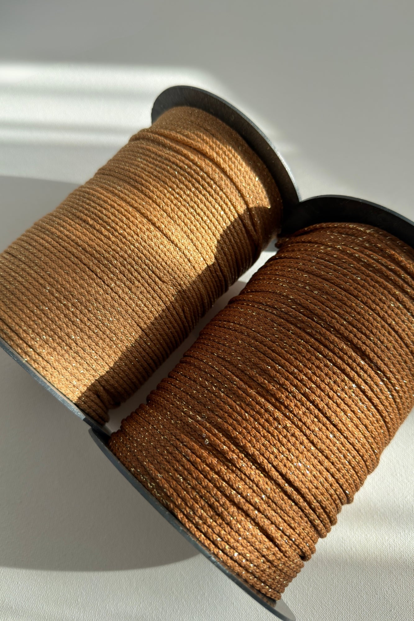 Close-up of 3mm brown macrame cord showing golden shimmer detail