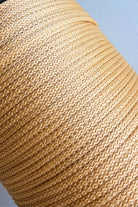 Close-up of 6mm royal golden macrame cord texture