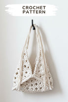 Crochet T-Shirt Yarn Bag Pattern - White color bag hanging on the hook