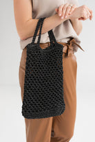 Black crochet beach bag with silver lurex yarn 