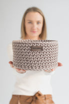Holding basket in hands 