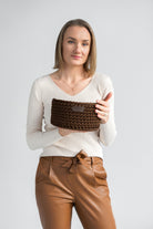 Brown crochet basket in my hands