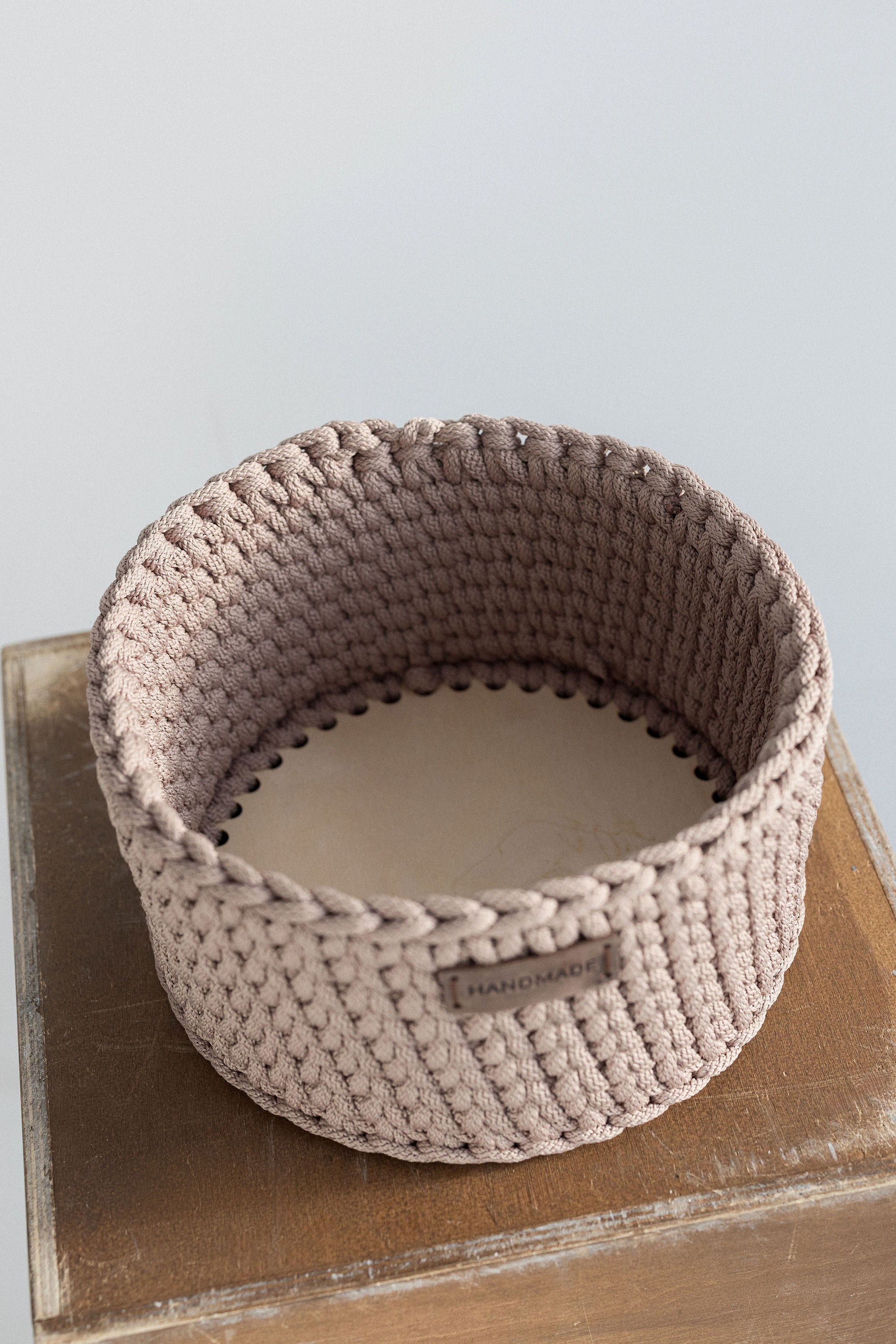 Beige crochet basket in details
